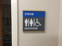 Highland Park Hospital (Restroom Sign); ADA Tactile and Braille Restroom Sign with Wood Frame